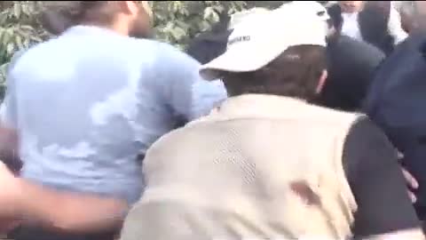 People carry Pakistan's former PM Imran Khan after he was shot