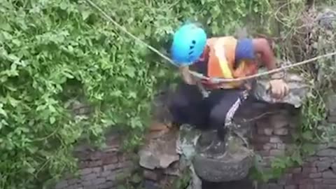 Guy Rappels Into Well To Rescue Stray Dog | The Dodo