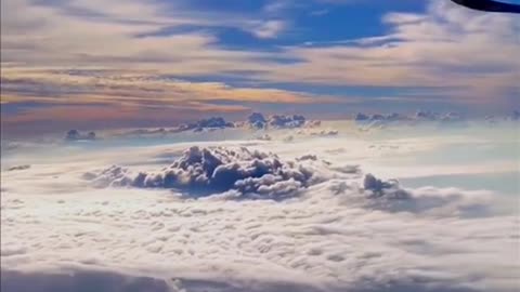 The clouds on the plane are really beautiful, like cotton candy