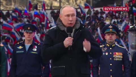 Russian President Vladimir Putin addresses thousands at rally in Moscow concert stadium