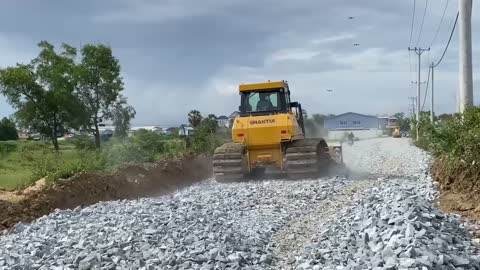 New bulldozer spreading gravel processing features building road foundation-20