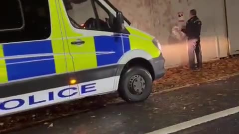 London : police officer removing pictures of kidnapped Israelis. Fucking insane.