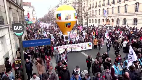 Thousands in Paris protest Macron's pension reforms