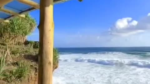 Beautiful waves crashing on the coast of the Indonesian archipelago