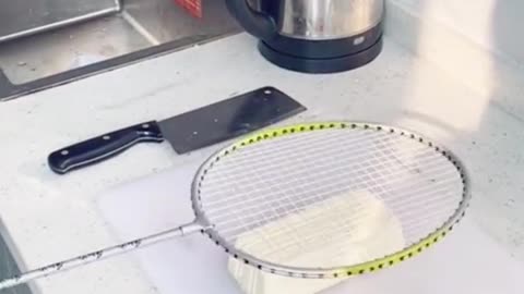 The racket can notonlyplay ball but also cut tofu.