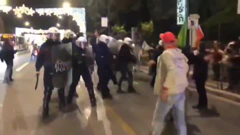 Kurds clash with police outside the French embassy in Athens