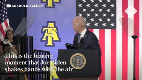 Joe Biden shakes hands
