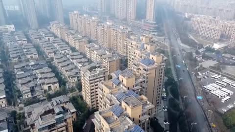 China orders entire city into home lockdown after 3 Covid cases discovered - BBC News