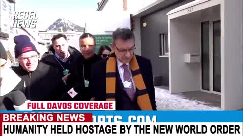 CEO OF PFIZER RAPED BY REBEL NEWS AT DAVOS....