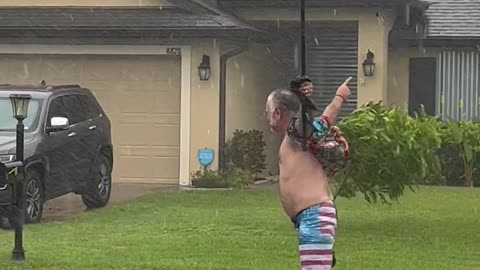 Hurricane Ian Welcomed by Man Waving America Flag