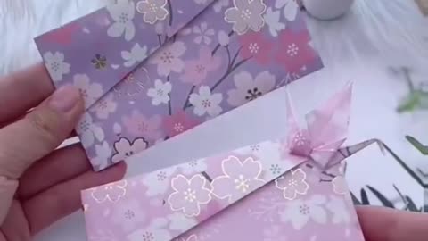 Make a unique origami envelope with cute bird decorations