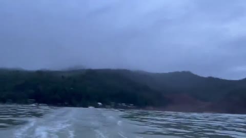 PHILIPPINES - video shows people on a boat fleeing the flood caused by the storm in the philippines