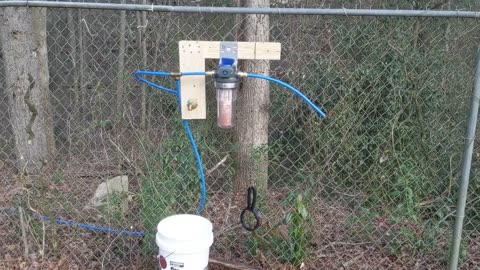 Setting up the Well Pump Filter for the Emergency Well Pump Project.