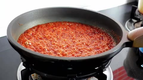 Chicken breast in bacon in a frying pan. Simple, fast and delicious!