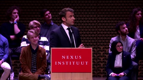 Protesters disrupt Macron's speech in The Hague