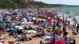 Brits flock to Bournemouth beach as temperatures soar