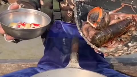 Chinese fisherman eating seafood | Chinese man eating octopus