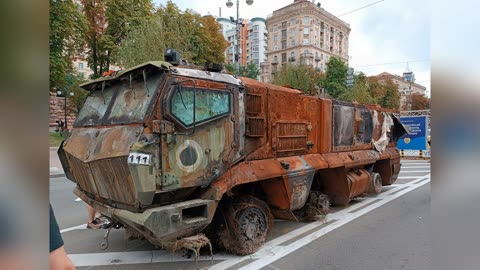 Destroyed russet vehicles in the center of Kyiv