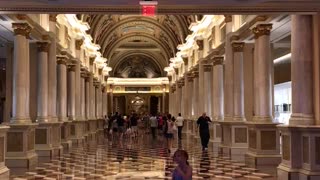 Granddaughter dancing under the chandelier in Lv Casino