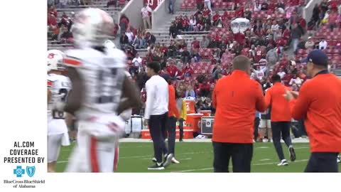 Cadillac Williams takes the field for warmups ahead of the Iron Bowl; shakes hands with Nick Saban