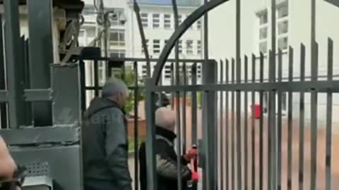 Warsaw police evicting and taking over a school building at the Russian embassy.