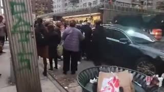 group of New Yorkers stop man from destroying posters of the Israeli civilians kidnapped by Hamas.