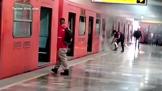 Carriage fire halts train on Mexico City's Metro