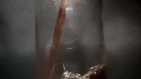 cold drink pouring in glass