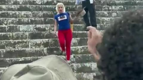 Angry crowd attacks woman tourist for climbing sacred Mayan pyramid