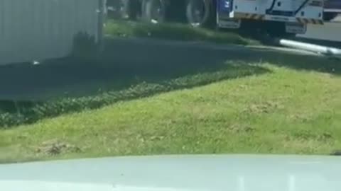 Truck Knocks Down Two Traffic Light Poles While Turning a Corner