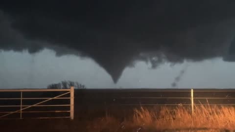 Massive tornado tears through open field in Kansas