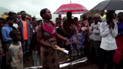 Malawi buries storm victims in flooded graves