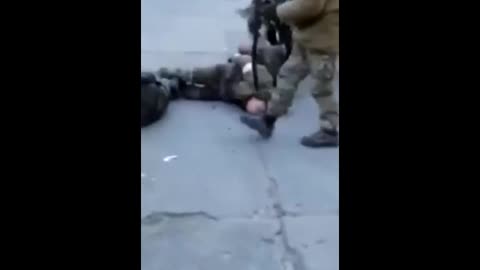 Ukraine's Asov Battalion Shooting Prisoners In The Leg