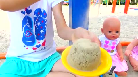 Polina playing cooking with toy Kitchen.Funny breakfast with baby dolls