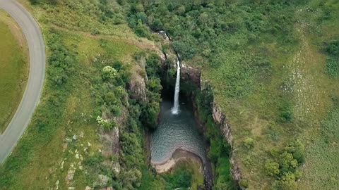 Waterfall Downpours To A River Vally Areal View Of Waterfall In HD