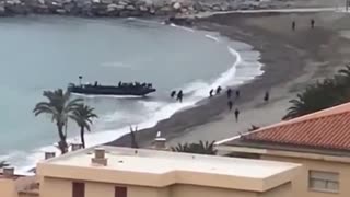 A shocked Spaniard films the invasion of illegal immigrants in Spain from his terrace