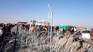 Thousands rush as Afghan border crossing opens
