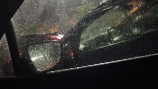 A car glass with night rain and smoke