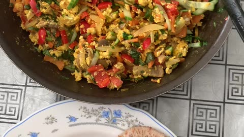 Colourful breakfast, veg stir fry with pitta bread