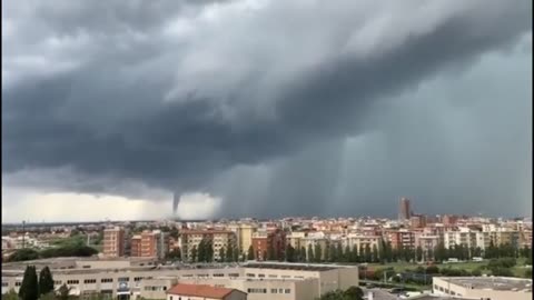 A Powerful Waterspout And Streaks Of Rain, Italy