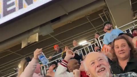 Guy Throws Free Pizza Into the Crowd At Detroit Monster Jam