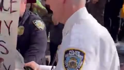 NYPD Deputy Chief Timothy Beaudette Shuts Down protester in his face