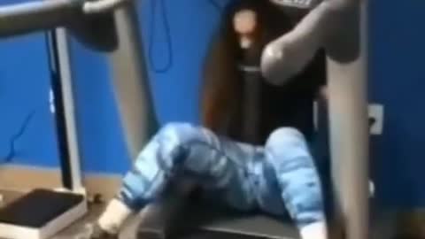 Girl Falling down Gym Treadmills
