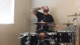 Drummer opens beer with drumstick and drinks after drum solo