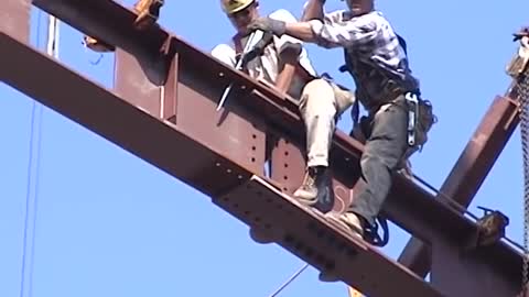 Leslie Dan- Erection of a Major Steel Beam at the Roof of the Atrium