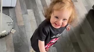 Little girl has fun making a mess