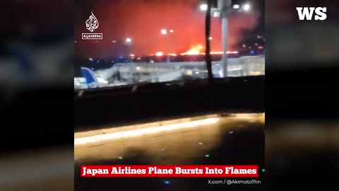 Japan Airlines plane bursts into flames