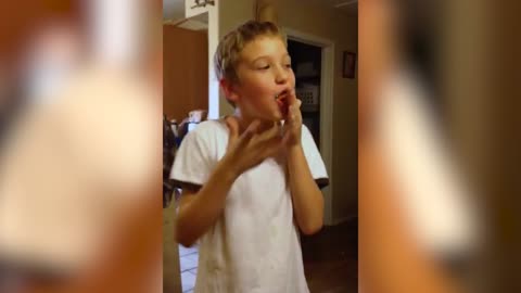 Boy Tastes Defeat From Mom's Mustard Cupcake Prank