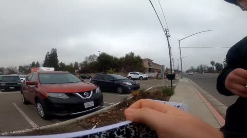 Hostile man in front of Islamic mosque