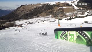Guy blue helmet skiing ramp lands on crotch